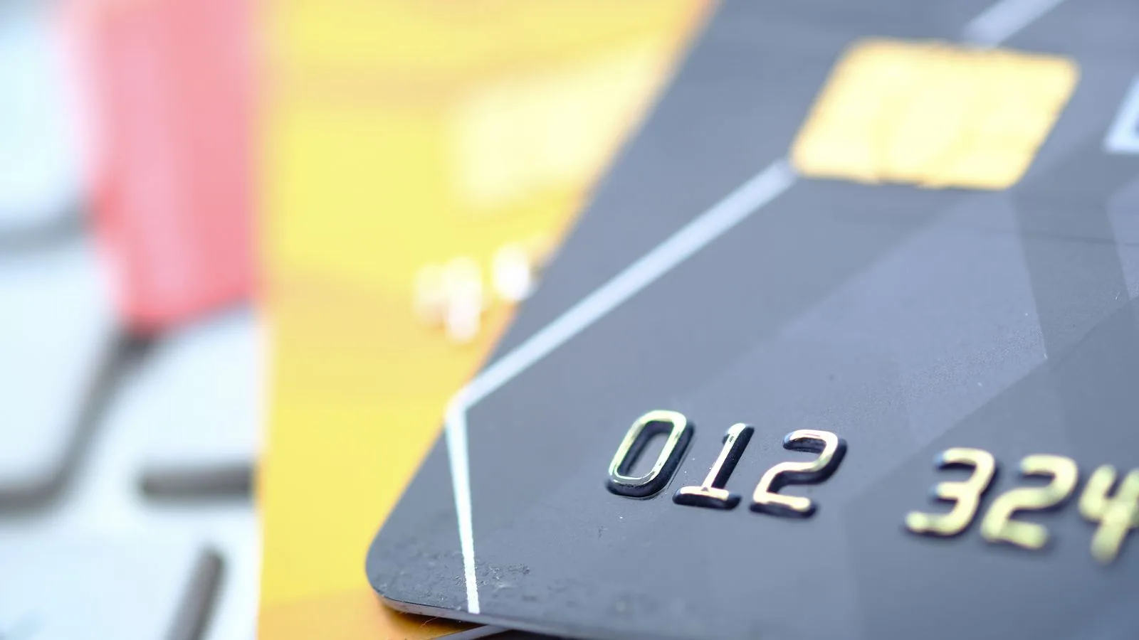 High-quality close-up of credit and debit cards, highlighting technology and security.