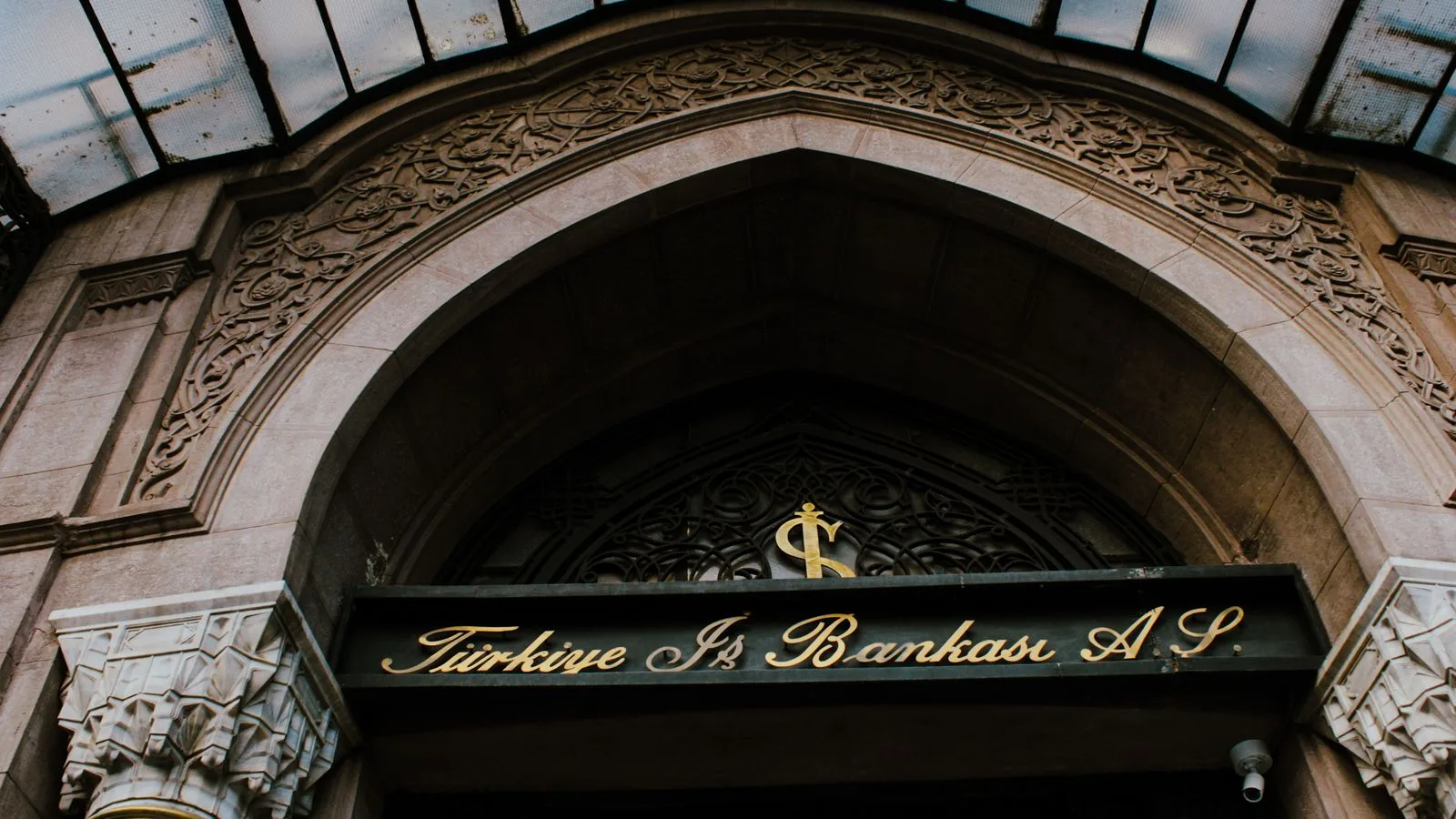 Elegant entrance of Türkiye İş Bankası with architectural details in Istanbul.